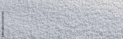 snow texture banner  fresh fallen snow on the ground on a frosty winter day