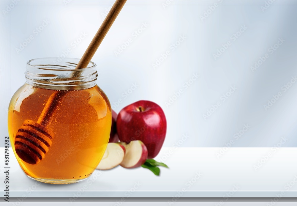 Fresh ripe Apples and honey in the jar