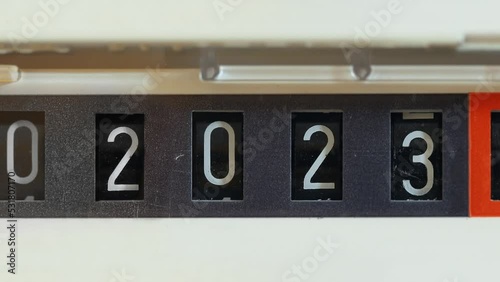 New year 2023 on a mechanical counter photo