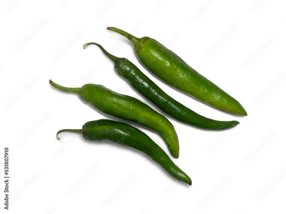Fresh green chili peppers. Spicy vegetable isolate. Peppers on a white background. Ingredient for dishes. The concept of spicy food. Fresh chili pepper. Harvesting vegetables for seasonings. Fresh green chili peppers. Spicy vegetable isolate. Peppers on a white background. Ingredient for dishes. The concept of spicy food. Fresh chili pepper. Harvesting vegetables for seasonings.