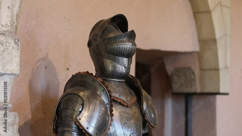Copper vintage knight armor with a spear from the medieval era in ...