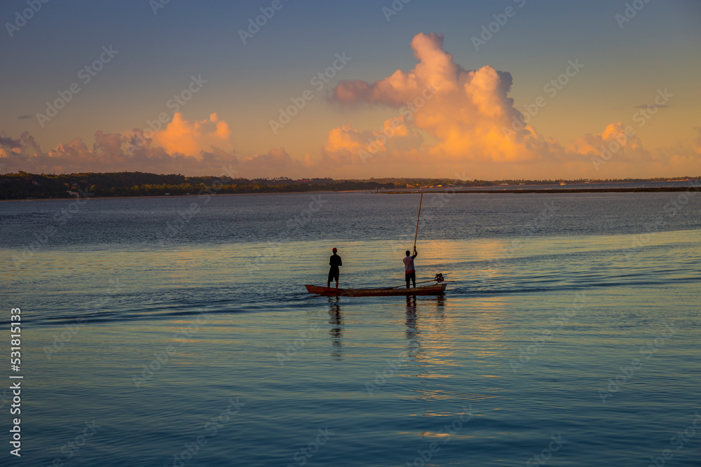 Fishing in Porto Seguro Beach at sunset in Trancoso, BAHIA