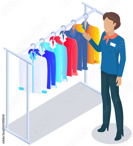 Shop assistant consultant helps buyer to choose product during shopping. Shopping mall, hangers with dresses and clothes in store. Purchaser service in commercial centre. Stylish garments boutique