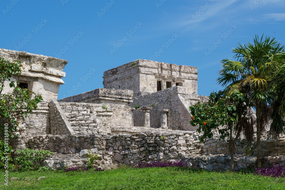 Ancient Mayan El Castillo Pyramid on a clear blue summer day