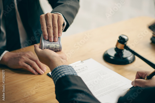 Canvas Print An attorney or officer accepts bribes from clients in the courtroom
