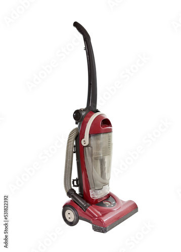 Old red vacuum cleaner isolated.