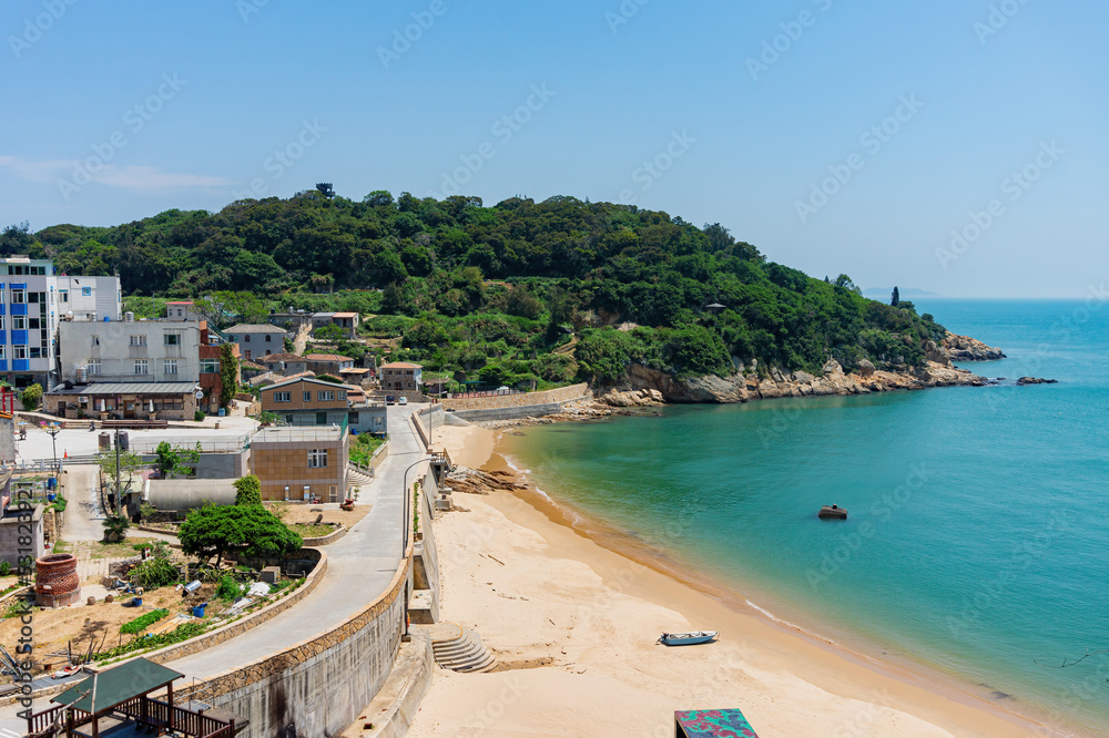 Sunny view of the town cityscape with beach view