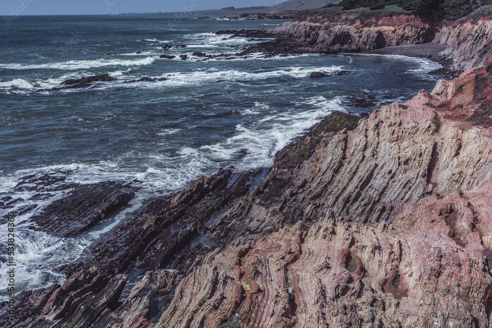 waves crashing on rocks