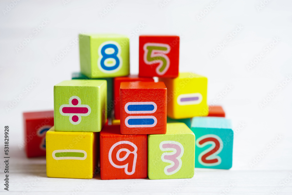 Number wood block cubes for learning Mathematic, education math concept. Number wood block cubes for learning Mathematic, education math concept.