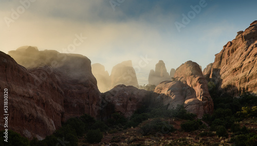 Print op canvas Arches National Park in the morning Misty fog