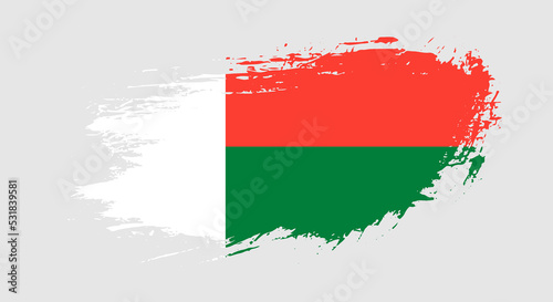 Free hand drawn grunge flag of Madagascar on isolated white background