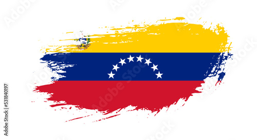 Free hand drawn grunge flag of Venezuela on isolated white background