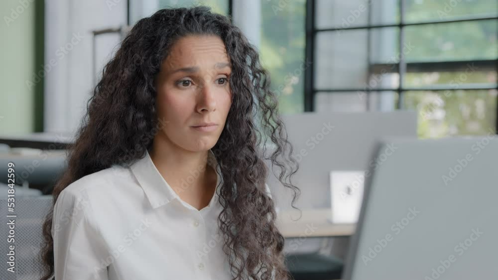 Close-up upset excited young woman looking at computer screen reading bad news receives nasty threatening email notification worried businesswoman upset about data loss due to network error breaking Close-up upset excited young woman looking at computer screen reading bad news receives nasty threatening email notification worried businesswoman upset about data loss due to network error breaking