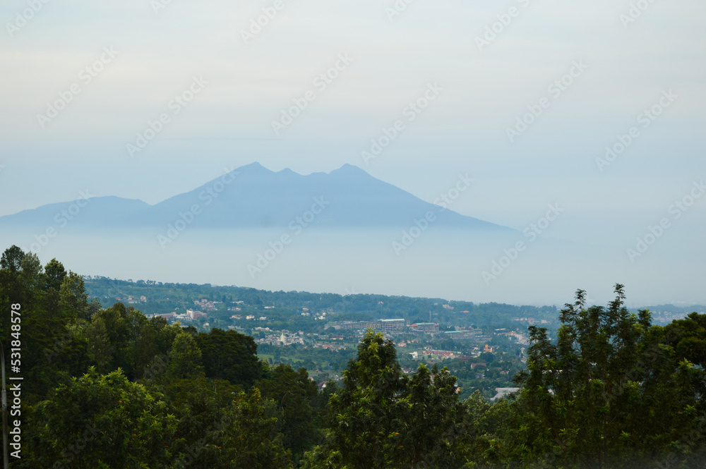 Naklejka premium Puncak Pass, Bogor, Indonesia – Novemer 22, 2020, With Blured Background, Light Bokeh Background.