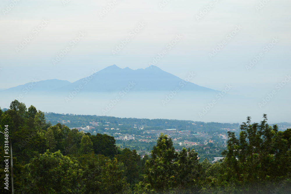 Puncak Pass, Bogor, Indonesia – Novemer 22, 2020, With Blured Background, Light Bokeh Background. Puncak Pass, Bogor, Indonesia – Novemer 22, 2020, With Blured Background, Light Bokeh Background.