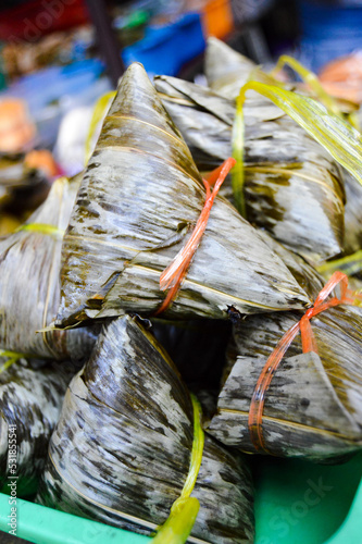 Krendang Street, Jakarta, Indonesia – August 22, 2022: Zongzi or Rouzong or Bah Chang with selected focus. photo