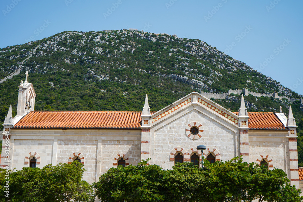 View on St. Blaise's Church and on defensive walls of Ston town, Peljesac Peninsula, Croatia. 