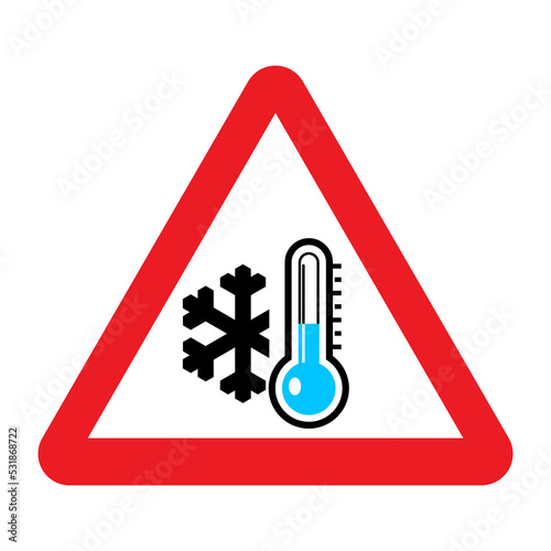 Low temperature warning sign. Vector illustration of red triangle sign with snowflake and blue thermometer icon inside. Winter concept. Very cold and freezing. Caution symbol isolated on background.