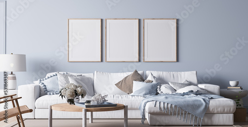 Modern bright living room in costal style, white sofa and wooden furniture on light blue wall background, 3d render  photo