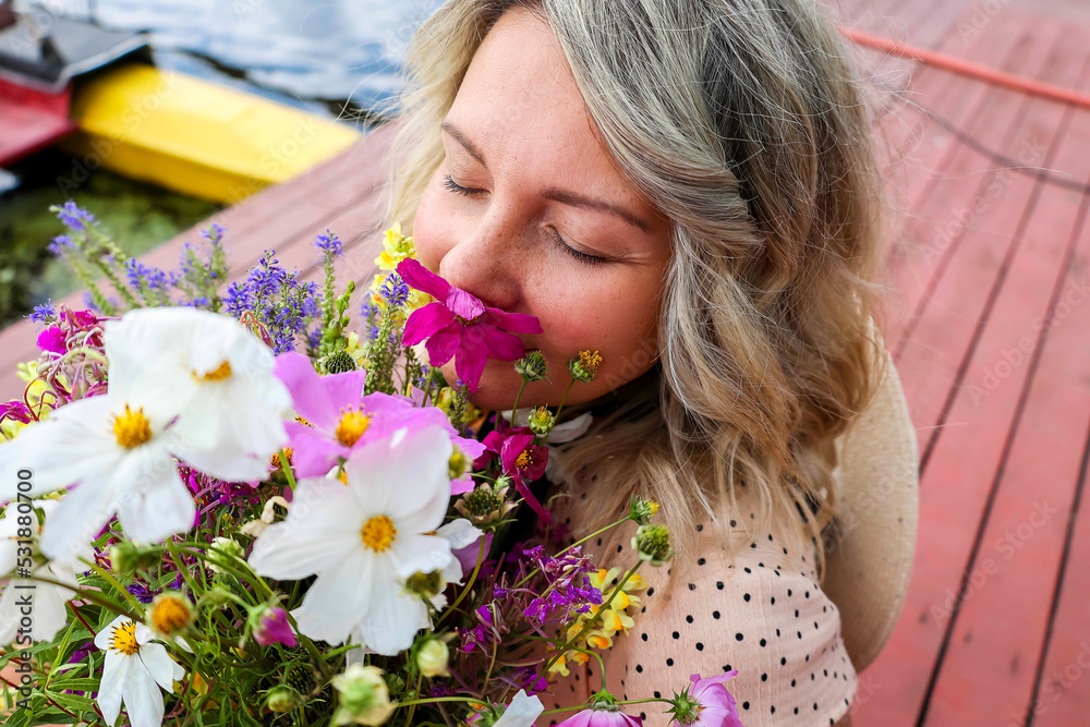 beautiful girl with wild flowers