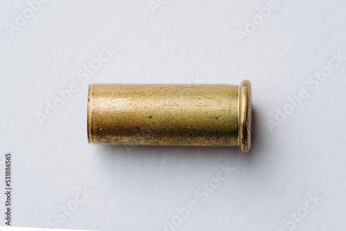 Pistol bullet casings isolated on white background  top view