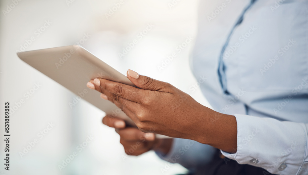 Hands of business woman working on a tablet analyzing annual company data or information for marketing campaign. Professional black girl with digital mobile tech for research on consumer sales trends Hands of business woman working on a tablet analyzing annual company data or information for marketing campaign. Professional black girl with digital mobile tech for research on consumer sales trends