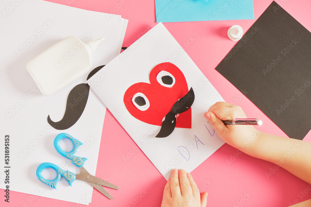 child makes a card for father's day, red paper heart with mustache, card for dad step by step instructions child makes a card for father's day, red paper heart with mustache, card for dad step by step instructions