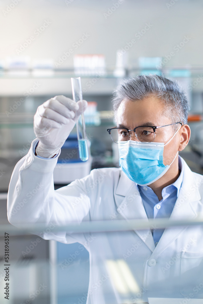 Scientist examining medical sample in laboratory Scientist examining medical sample in laboratory