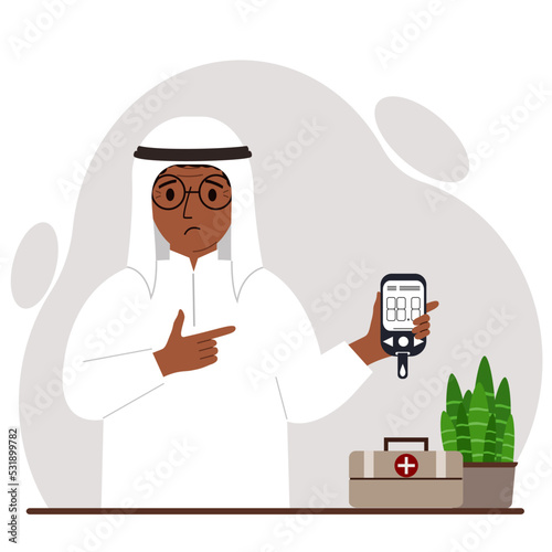 Sad man holds a glucometer in his hand. The concept of blood sugar control, diabetic.