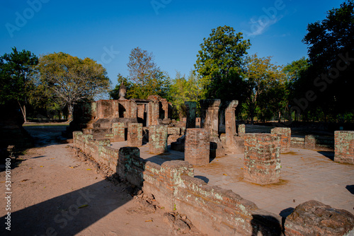 Ancient city of Sukhothai historical sites with ruins of Buddhist Temple Wat Si Chum and Wat Mahathat at the Sukhothai Historical Park, Thailand
