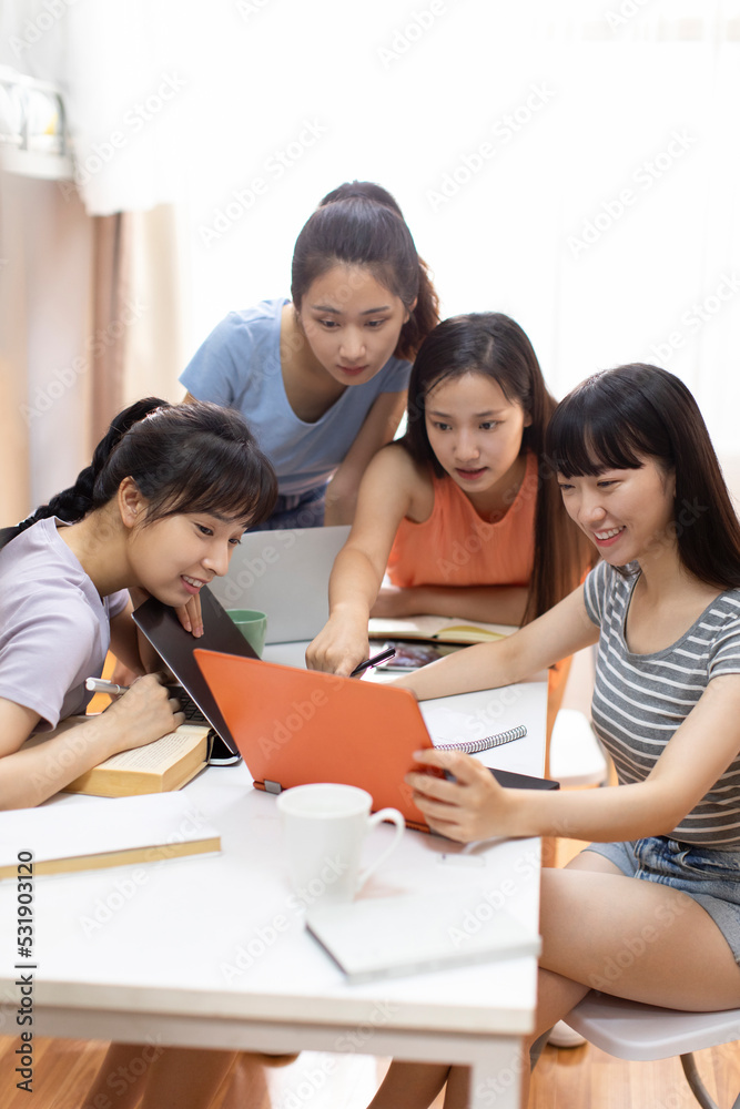 Young university students learning in dormitory Young university students learning in dormitory