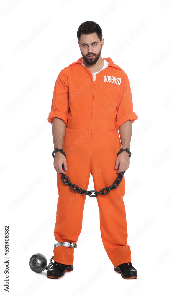 Prisoner in jumpsuit with chained hands and metal ball on white background Prisoner in jumpsuit with chained hands and metal ball on white background