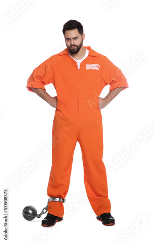 Prisoner in jumpsuit with metal ball on white background