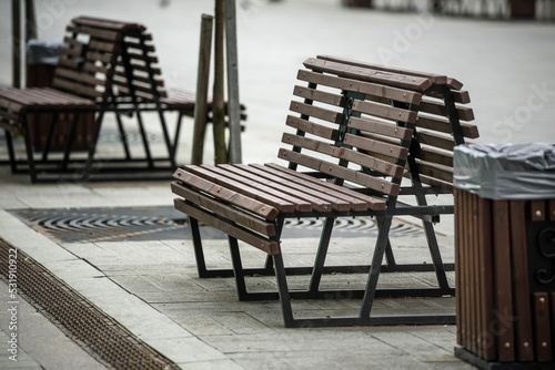 Empty bench in the city square, close-up