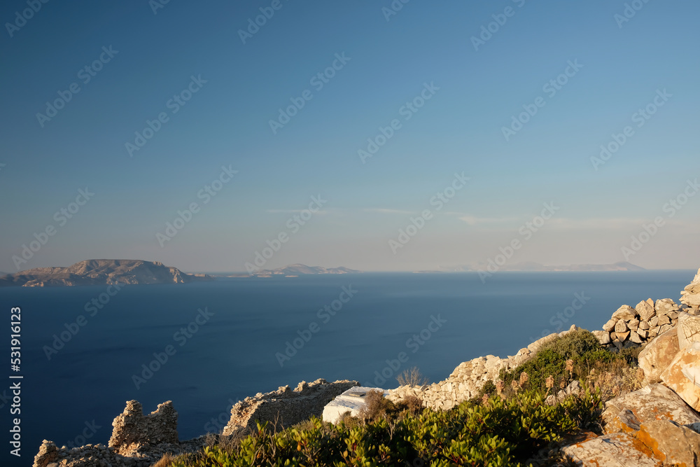 Panoramic view of the Aegean Sea and ancient ruins of the fortification of Paleokastro in Ios