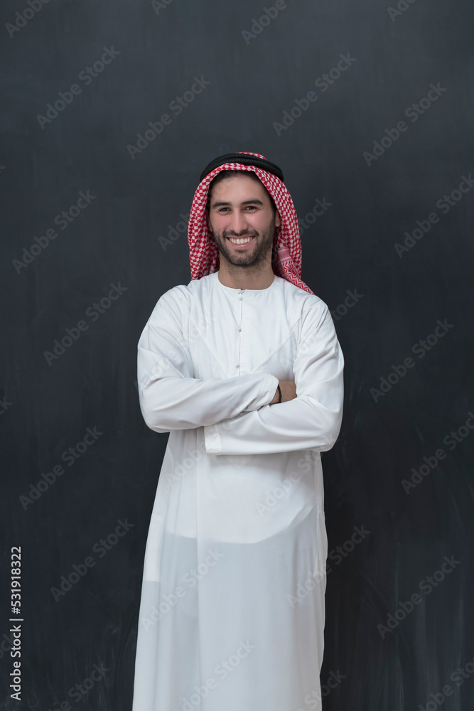 Portrait of young muslim man wearing traditional clothes Portrait of young muslim man wearing traditional clothes