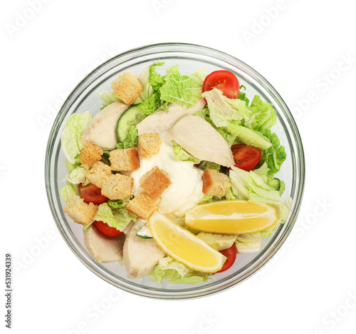 Bowl of delicious salad with Chinese cabbage, meat and bread croutons isolated on white, top view