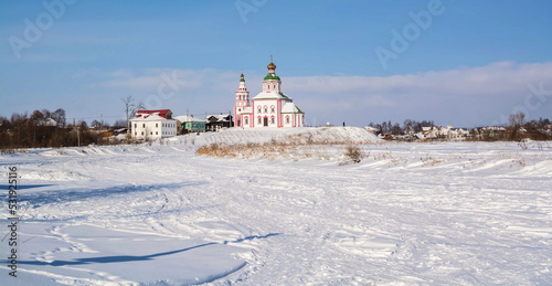 The Golden Ring of Russia. A small Orthodox church in the middle of a snow-covered field