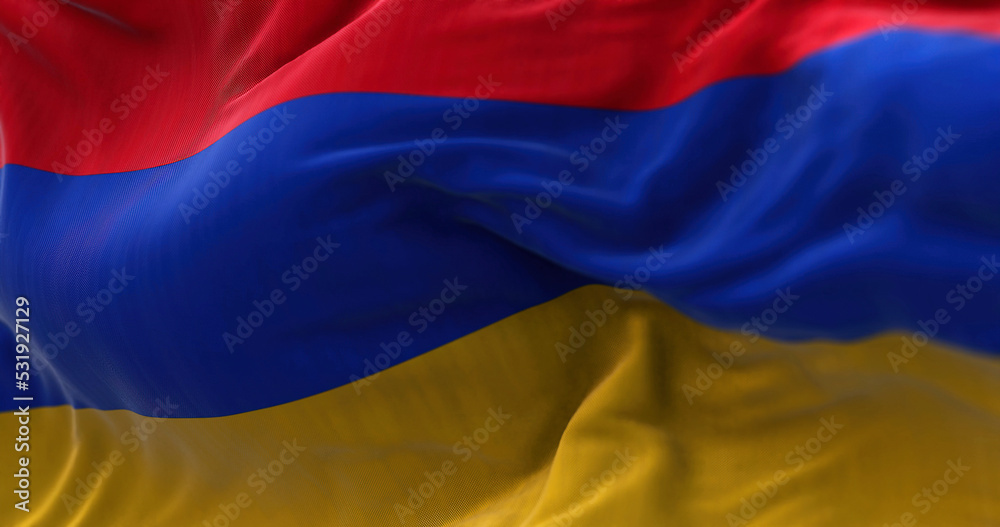 Naklejka premium Close-up view of the armenian national flag waving in the wind