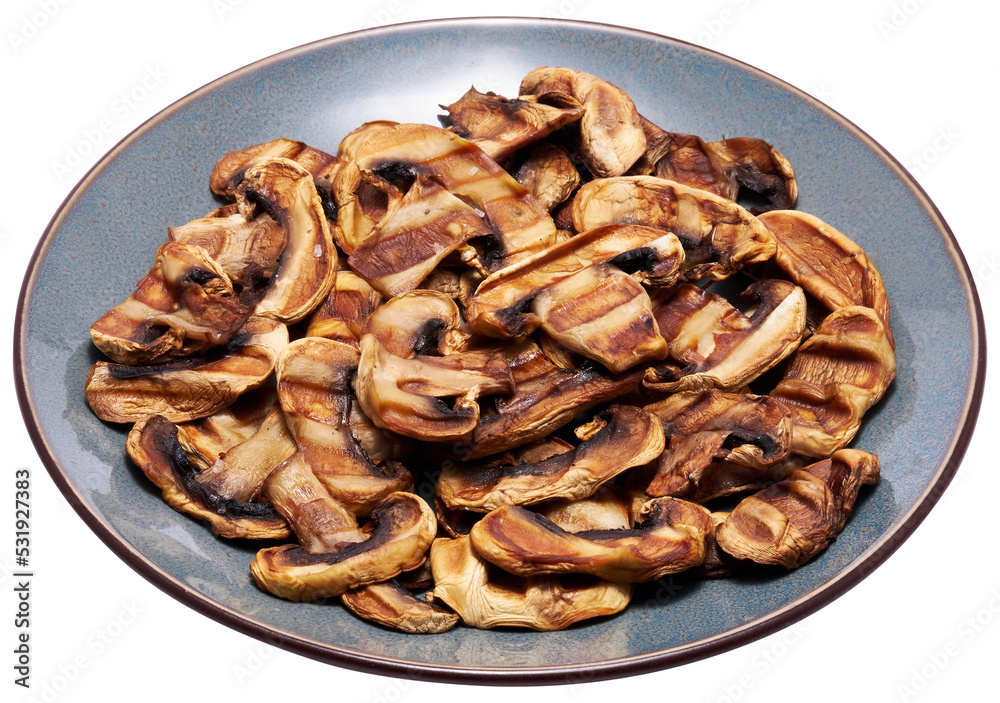 Grilled Slices of champignon mushrooms with stripes from a grill in ceramic plate Grilled Slices of champignon mushrooms with stripes from a grill in ceramic plate