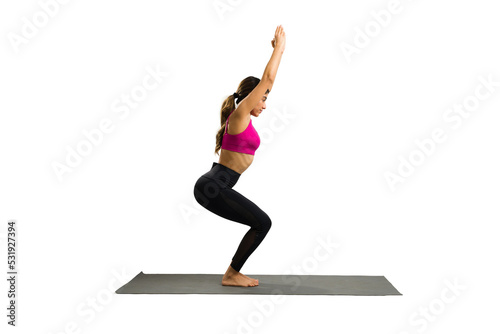 Hispanic young woman practicing a chair yoga pose