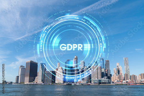 Skyline of New York City Financial Downtown Skyscrapers over East River from park, Dumbo at day time, Manhattan. GDPR hologram, concept of data protection, regulation and privacy for all individuals