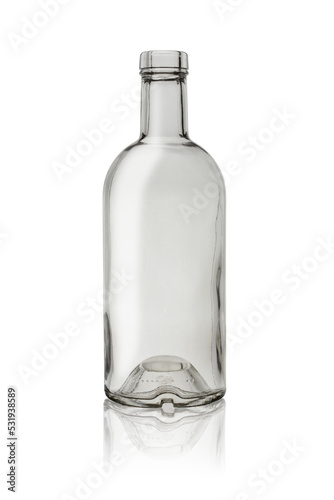 An empty open transparent glass bottle for liquids and beverages. Isolated on a white background with reflection.