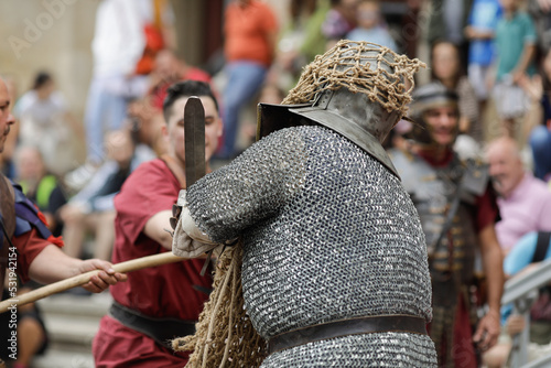 Ancient Roman gladiator during a historic reenactment event.