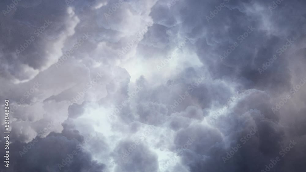 view of flying through dark clouds with bright light in the sky view of flying through dark clouds with bright light in the sky