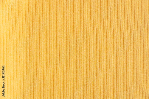  Ribbed cotton fabric texture yellow color . Close up rib cotton cloth and textiles pattern. Natural organic fabrics texture background.