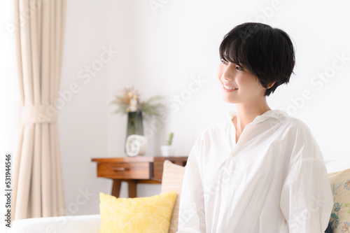 Woman relaxing in her room