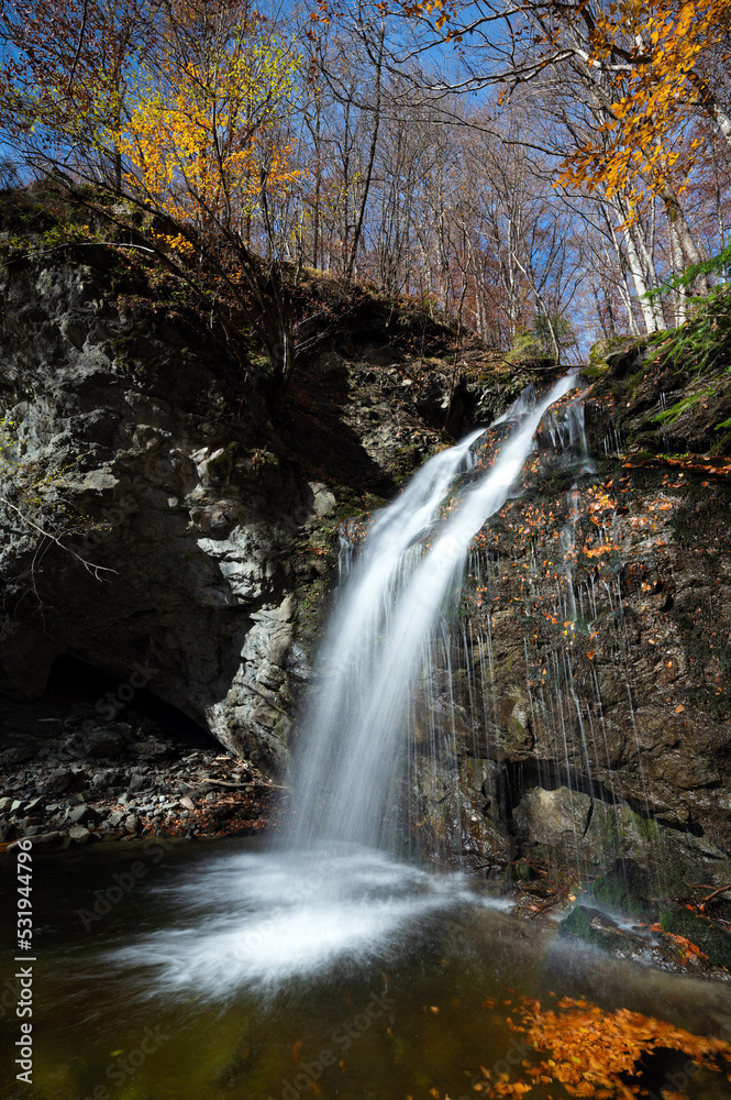 Naklejka premium Waterfall in the virgin forest of Frakto in Macedonia, Greece
