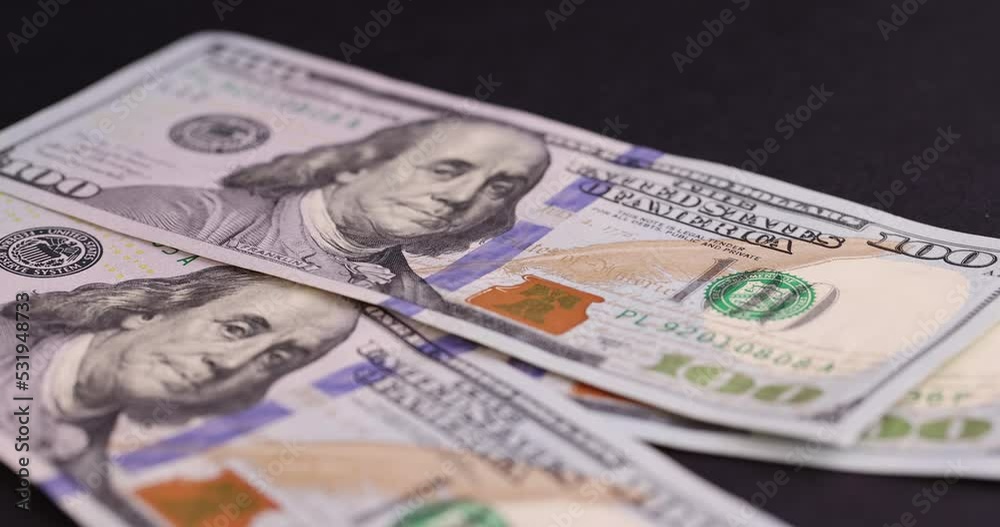 counting American cash bills on black paper, cash paper new American dollars counting American cash bills on black paper, cash paper new American dollars
