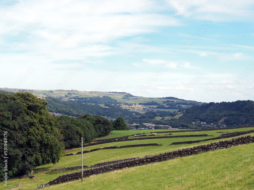 view of the calder valley in calderdale west yorkshire with the village of mytholmroyd visible in the distance view of the calder valley in calderdale west yorkshire with the village of mytholmroyd visible in the distance